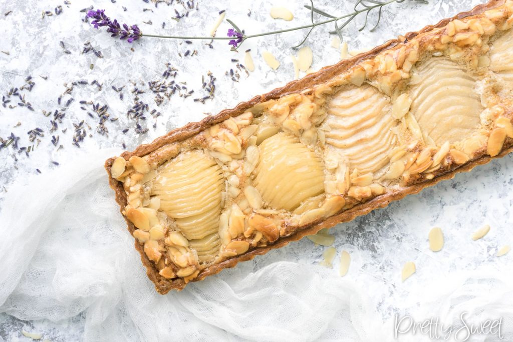 Pear frangipane tart with lavadner from bird's perspective close up